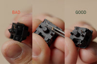 Check that each switch's pins are straight. Bend any bent pins straight again with tweezers.